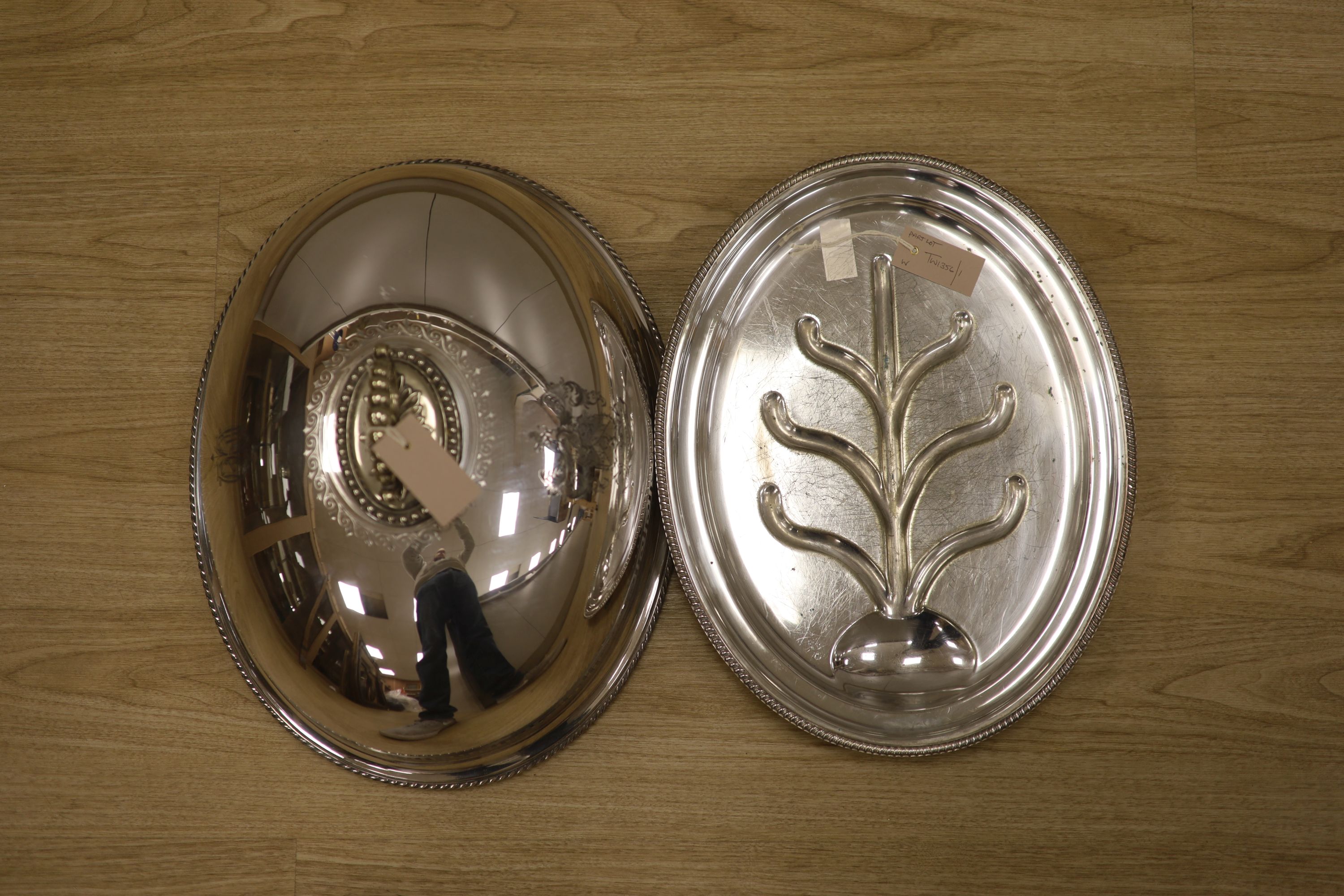 A Victorian electro-plated meat cover by Elkington having Greek key pattern and armorial, with associated venison dish, overall height